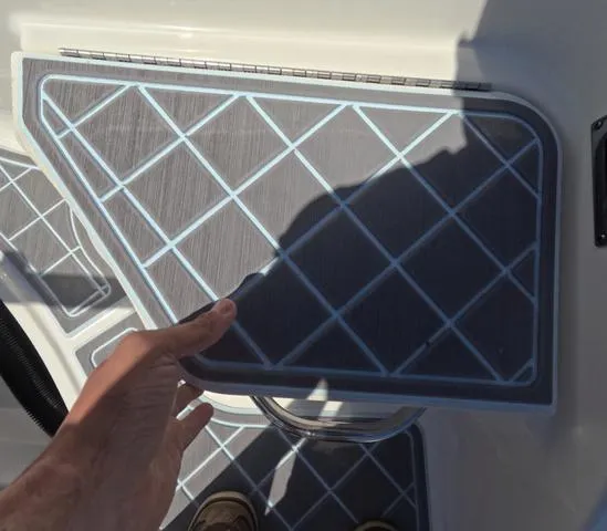 Slide: The Image of 2019 Chaparral 191 Suncoast boat deck with custom non-slip mat installation. - 10