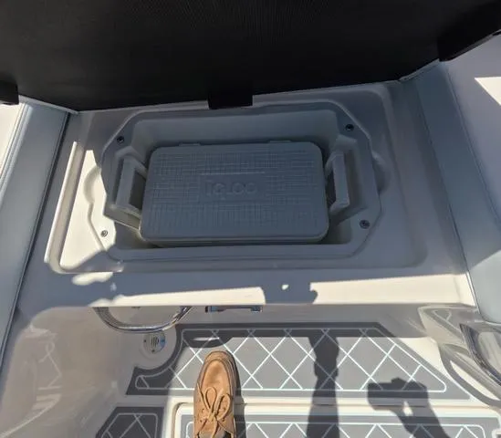 Slide: The Image of Built-in cooler on 2019 Chaparral 191 Suncoast boat deck. - 21