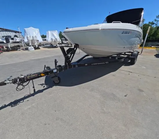 Slide: The Image of 2019 Chaparral 191 Suncoast boat on trailer in sunny outdoor setting. - 4