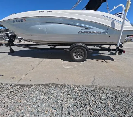 Slide: The Image of 2019 Chaparral 191 Suncoast boat on trailer, parked on concrete surface. - 5