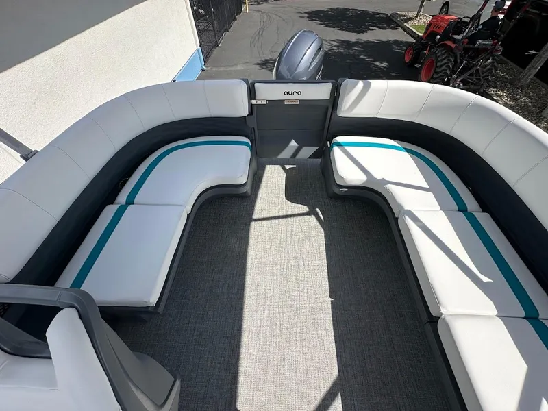 Slide: The Image of 2025 Aura Quad Lounge boat interior with spacious seating and modern design. - 10