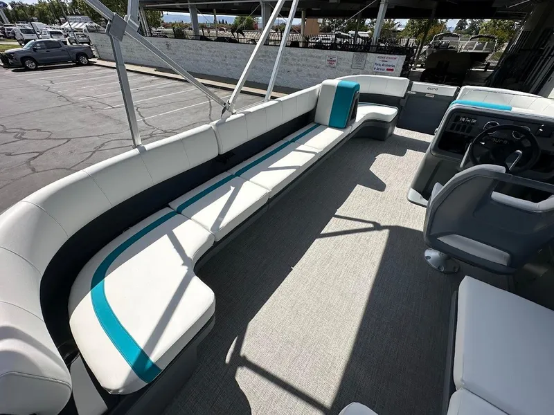 Slide: The Image of 2025 Aura Quad Lounge boat interior with spacious seating and modern design. - 13