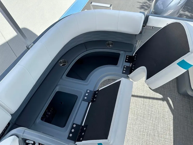 Slide: The Image of 2025 Aura Quad Lounge boat seating with storage compartments and modern design. - 24