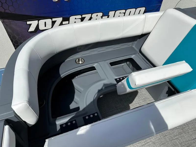 Slide: The Image of 2025 Aura Quad Lounge boat seating with cup holder, featuring modern design and comfortable upholstery. - 27