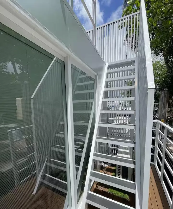 Slide: The Image of Modern Struktures MS 360, 2023 model, featuring sleek white exterior stairs and glass panels. - 3