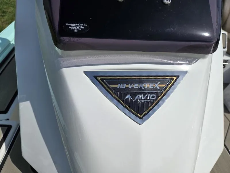 Slide: The Image of 2025 Avid 18 Vertex boat emblem on white surface. - 10