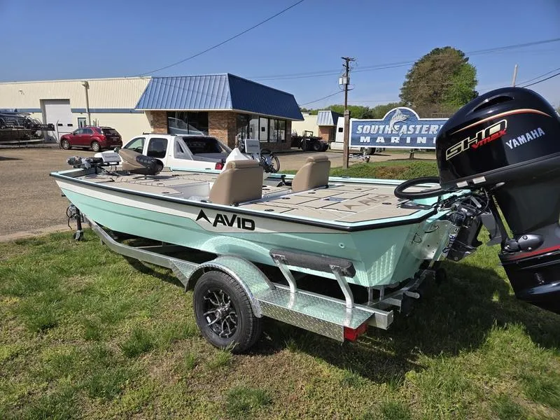 Slide: The Image of 2025 Avid 18 Vertex boat on trailer, parked outside Southeastern Marine dealership. - 4