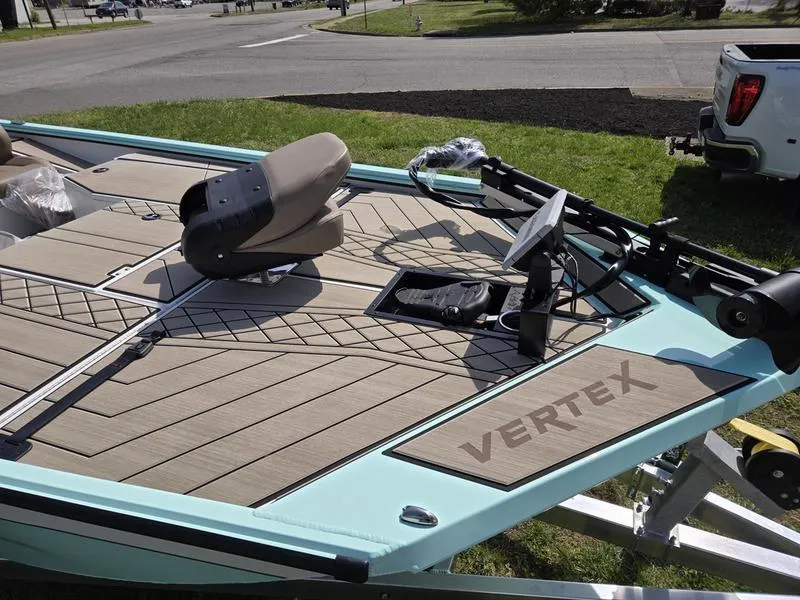 Slide: The Image of 2025 Avid 18 Vertex boat with sleek deck design and modern seating. - 8