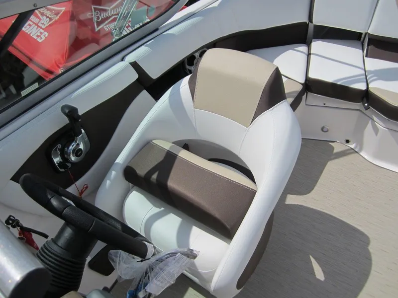 Slide: The Image of 2015 Regal 2000 ES boat interior with beige and white seating. - 5