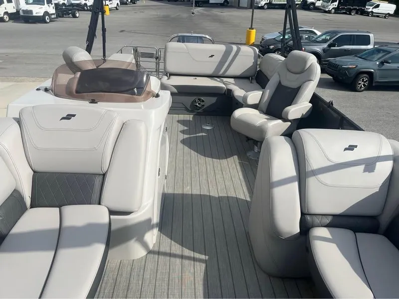Slide: The Image of 2023 Starcraft SLS 3 Q DH boat interior with luxurious seating and modern design. - 6