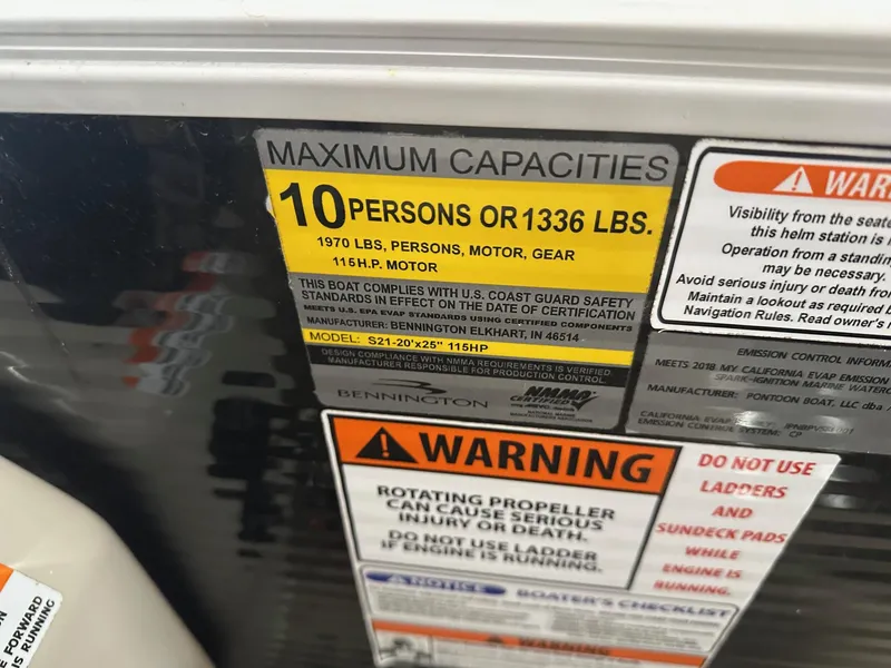 Slide: The Image of 2018 Bennington 21 SSRCX boat capacity label, 10 persons or 1336 lbs, 115 HP motor. - 3