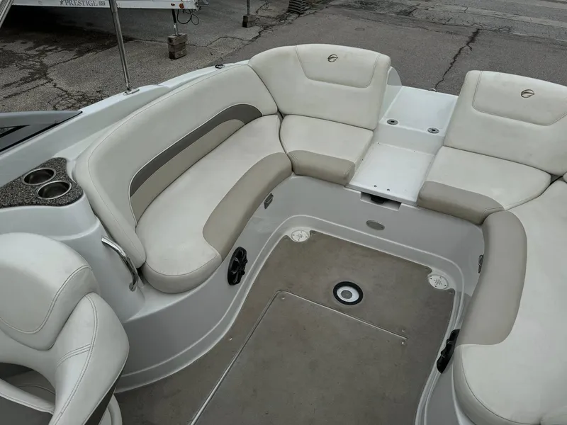 Slide: The Image of 2008 Crownline Bowrider 240 LS interior with spacious seating and cup holders. - 18