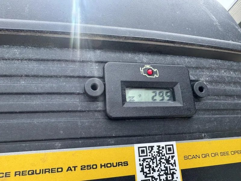 Slide: The Image of Digital display on Gator Tail 1748, 2025 model, showing engine hours and maintenance alert. - 16