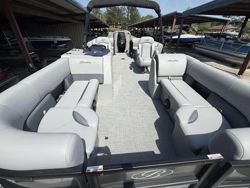 Slide: The Image of 2025 Bentley Pontoons Legacy 220 Navigator with spacious seating and modern design. - 3