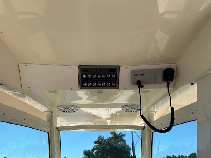 Slide: The Image of 2017 Scout 320 LXF boat interior with Garmin equipment and control panel. - 29