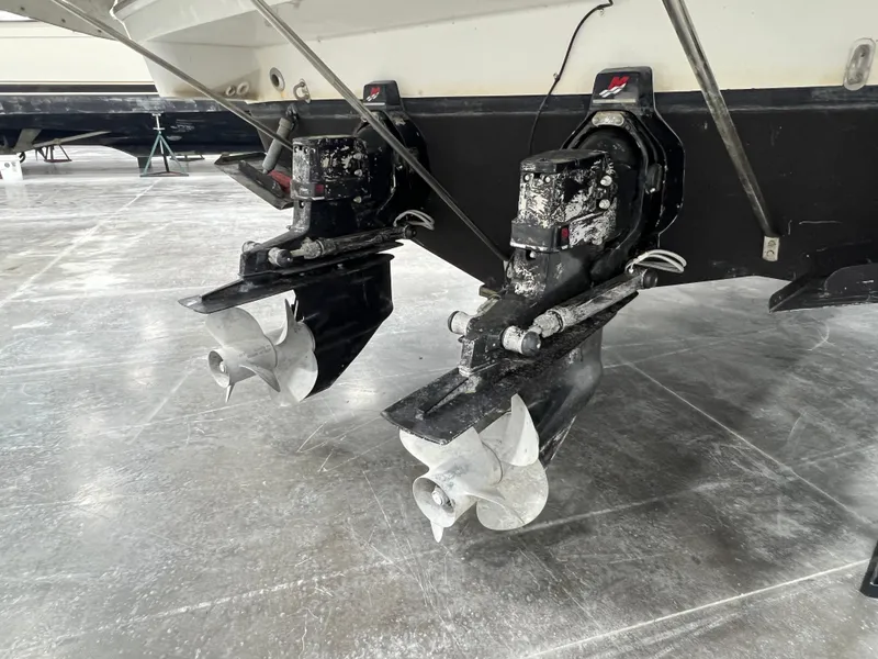 Slide: The Image of Dual propellers on a 2000 Formula 31 PC boat in a storage facility. - 25