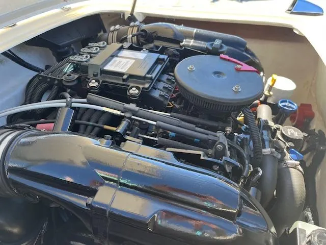 Slide: The Image of Engine of a 2012 Hornet 17 HiPerformance boat, showcasing intricate components and design. - 6