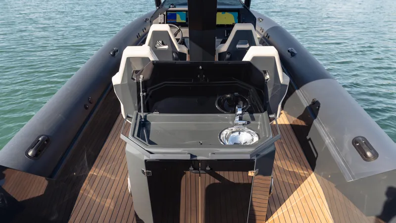 Slide: The Image of 2025 Skipper-BSK 38 boat with sleek deck and modern amenities. - 17