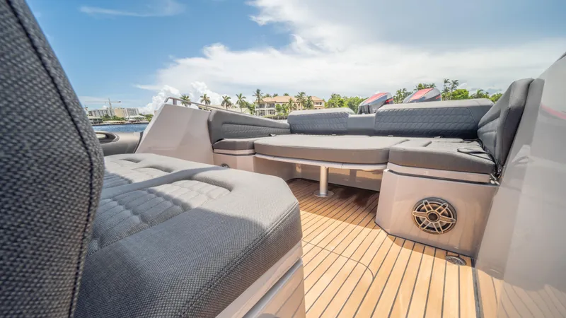 Slide: The Image of Luxurious 2025 Skipper-BSK 38 boat interior with plush seating and teak flooring. - 16