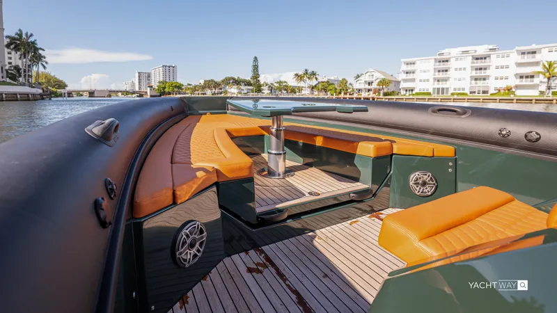 Slide: The Image of Luxurious 2025 Skipper-BSK 38 yacht interior with orange seating and sleek design. - 42