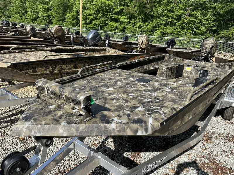 Slide: The Image of 2025 Excel Viper F4 1751 boat with camouflage design on a trailer. - 13