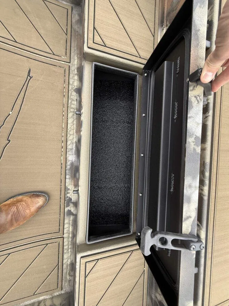 Slide: The Image of 2025 Thor Lake Hammer 1754 Timber Hammer boat storage compartment with Seadeck flooring. - 10