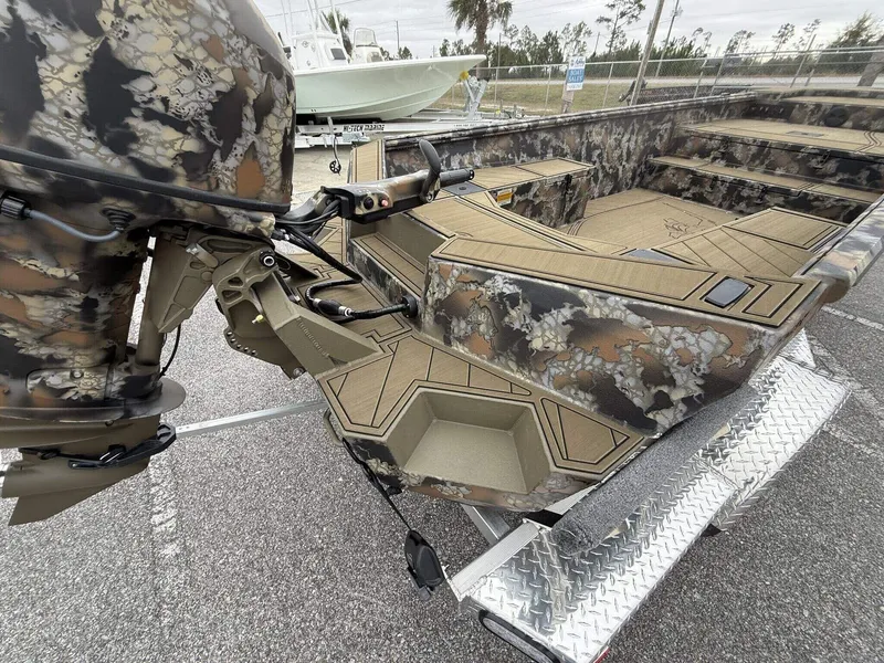 Slide: The Image of 2025 Thor Lake Hammer 1754 Timber Hammer boat with camouflage design and Seadeck flooring. - 9