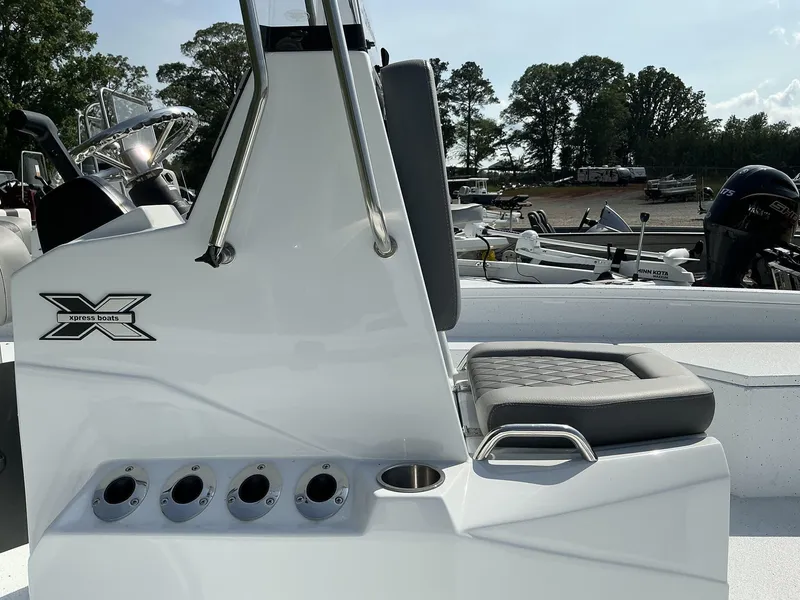 Slide: The Image of 2025 Xpress Hyper-Lift Series H22B boat with seating and rod holders. - 7