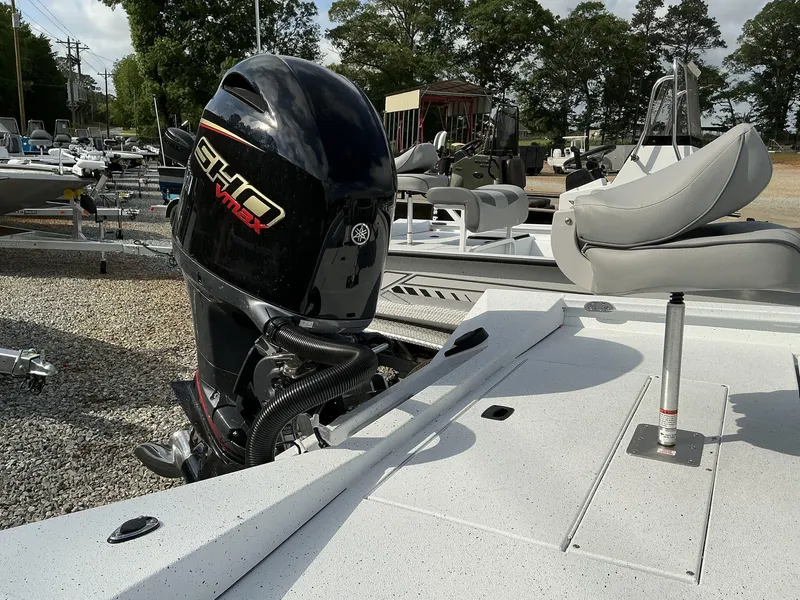Slide: The Image of 2025 Xpress Hyper-Lift Series H22B boat with Yamaha VMAX SHO outboard motor. - 11