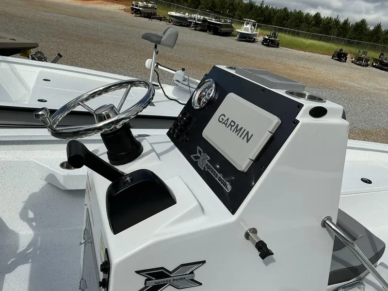 Slide: The Image of 2025 Xpress Hyper-Lift H22B boat console with Garmin navigation system. - 7