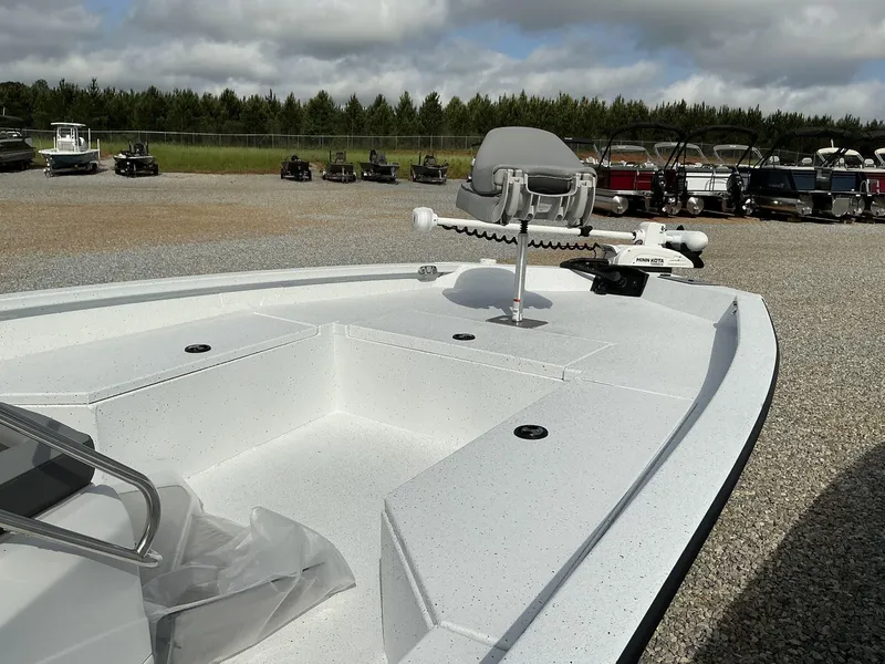 Slide: The Image of 2025 Xpress Hyper-Lift Series H22B boat, white deck, outdoor display, cloudy sky background. - 8