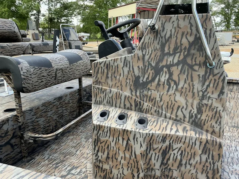 Slide: The Image of 2025 Xpress Hyper-Lift Bay Series 210 BAY-175 HP boat with camouflage interior design. - 3