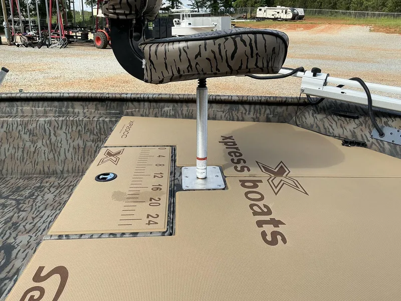 Slide: The Image of 2025 Xpress Xplorer Series XP20CC boat deck with seat and measurement markings. - 8