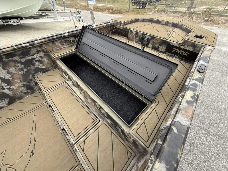 Slide: The Image of 2025 Thor Lake Hammer 1754 Timber Hammer boat with Seadeck flooring, open storage compartment. - 5