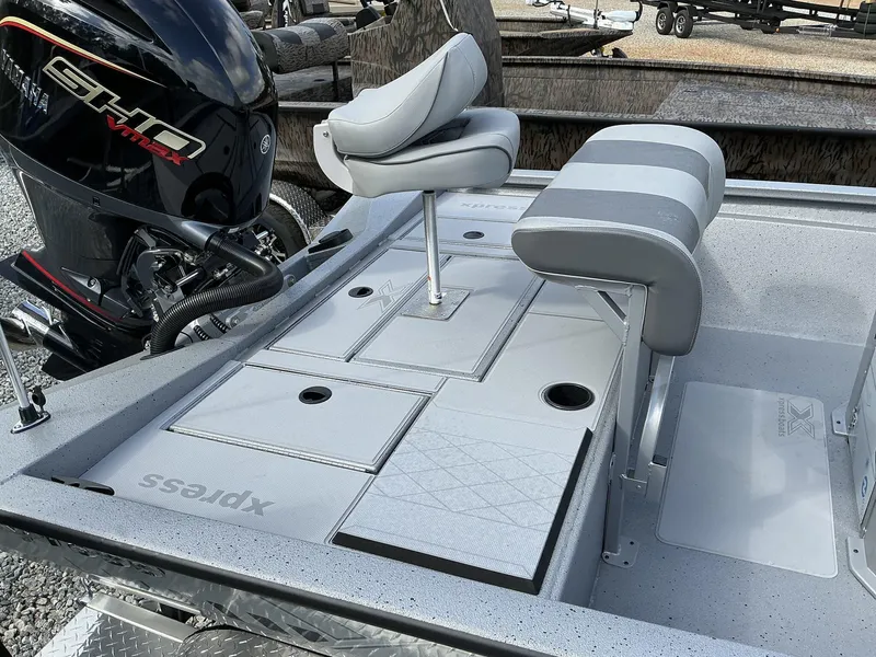 Slide: The Image of 2025 Xpress Hyper-Lift Bay Series 210 BAY-175 HP boat interior with Yamaha engine. - 3