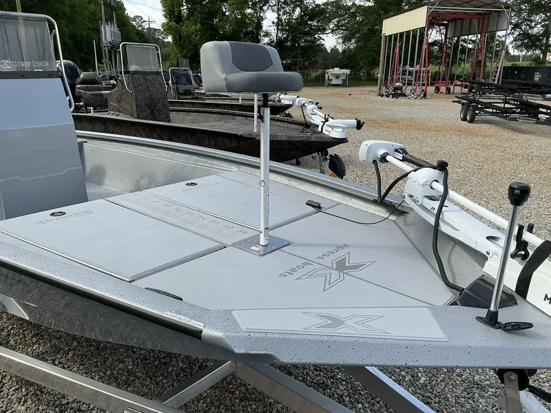 Slide: The Image of 2025 Xpress Hyper-Lift Bay Series 210 BAY-175 HP boat, featuring a sleek deck design. - 7
