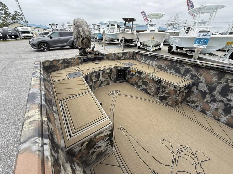 Slide: The Image of 2025 Thor Lake Hammer 1754 Timber Hammer boat with Seadeck, camo design, in a sales lot. - 4