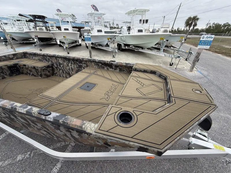 Slide: The Image of 2025 Thor Lake Hammer 1754 Timber Hammer boat with Seadeck, parked at a sales lot. - 7