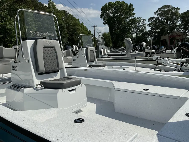 Slide: The Image of 2025 Xpress Hyper-Lift Series H22B boat with sleek seating and modern design. - 5
