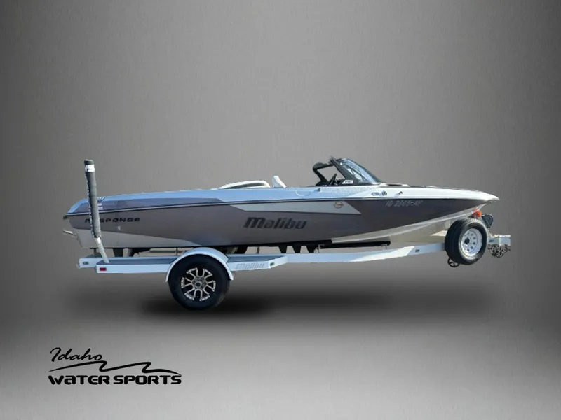 Slide: The Image of 2017 Malibu Response TXi boat on trailer, Idaho Water Sports logo. - 1