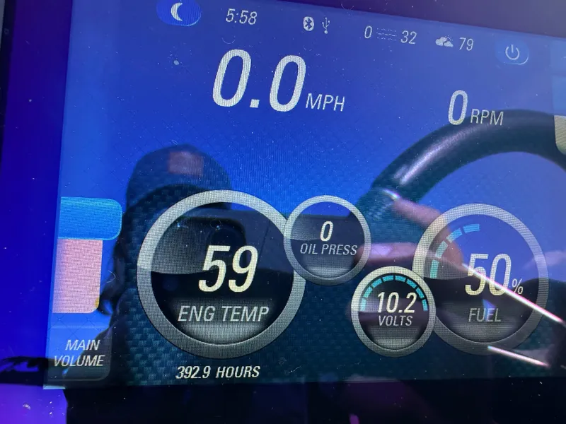 Slide: The Image of Dashboard display of a 2017 Malibu Response TXi showing engine temperature and fuel level. - 15
