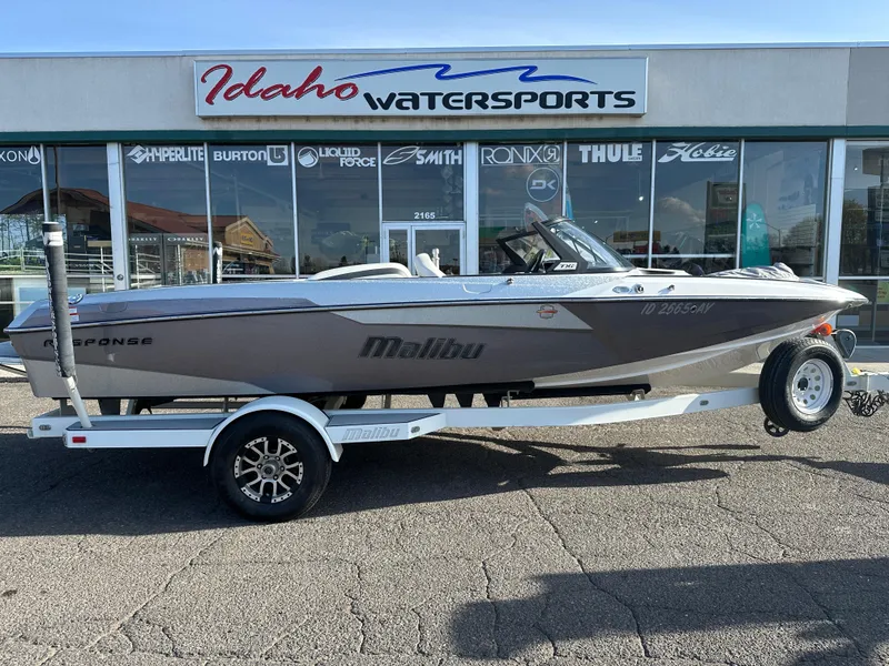 Slide: The Image of 2017 Malibu Response TXi boat on trailer at Idaho Watersports dealership. - 2