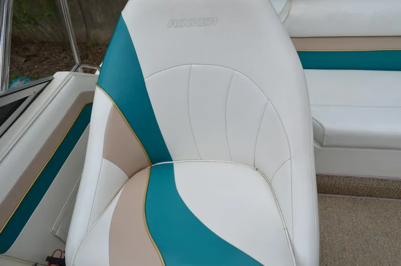 Slide: The Image of White and teal seat on 1996 Rinker 300 Fiesta Vee boat. - 27