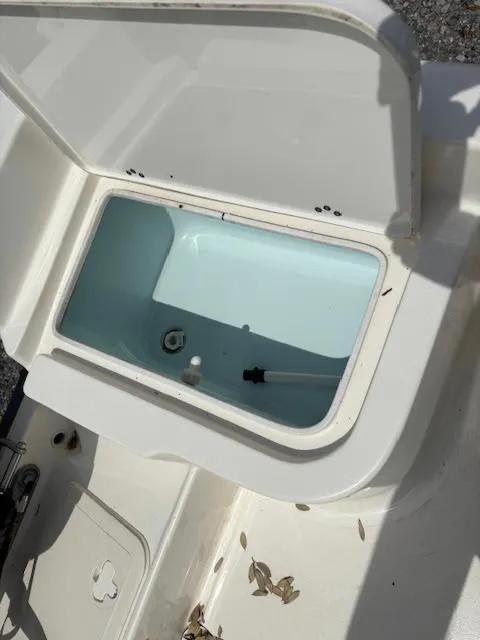 Slide: The Image of Open storage compartment on 2020 Key West 1720 Sportsman boat. - 11