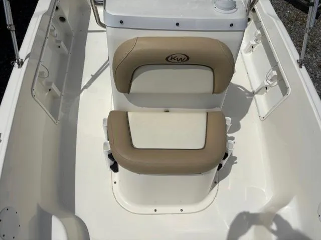 Slide: The Image of 2020 Key West 1720 Sportsman boat interior with cushioned seating. - 8
