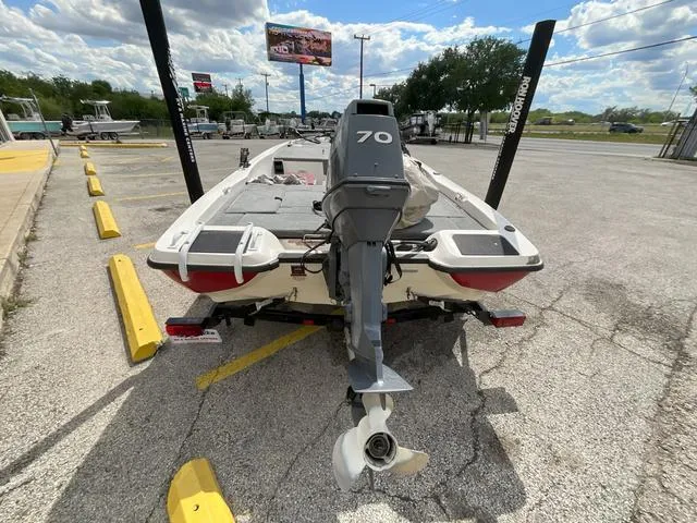 Slide: The Image of 2007 Stratos 176XT boat with 70HP motor in parking lot, rear view. - 18