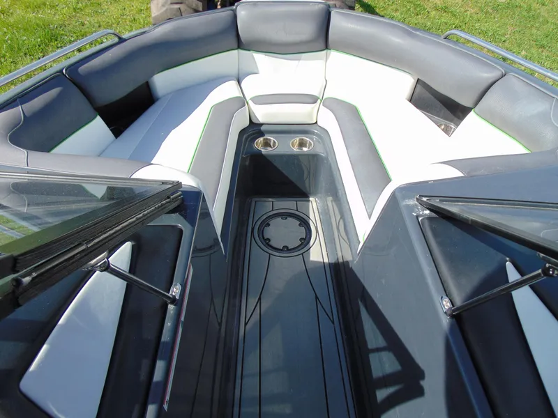 Slide: The Image of 2018 Moomba Mondo boat interior with sleek seating and cup holders. - 20