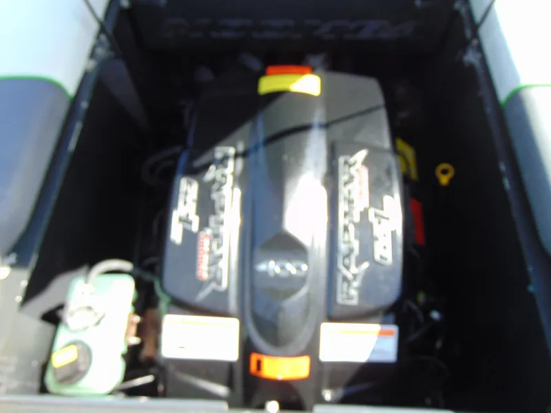 Slide: The Image of 2018 Moomba Mondo engine compartment with visible components and branding. - 22