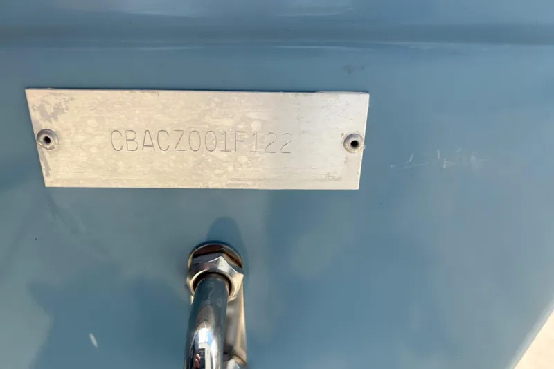 Slide: The Image of 2022 Cobia 301 Center Console boat identification plate with serial number. - 35