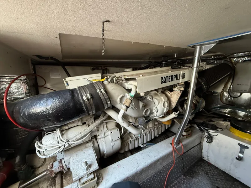 Slide: The Image of Engine room of 1999 Ocean Yachts 40 Super Sport with Caterpillar engine. - 19